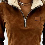 Petra – Elegante Damenbluse mit Fell und Fransen
