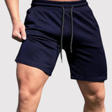 Thees™ | Flexible Fitness Shorts Featuring Side Pockets