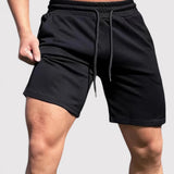 Thees™ | Flexible Fitness Shorts Featuring Side Pockets